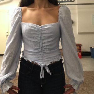 Ruffled top with peasant sleeves